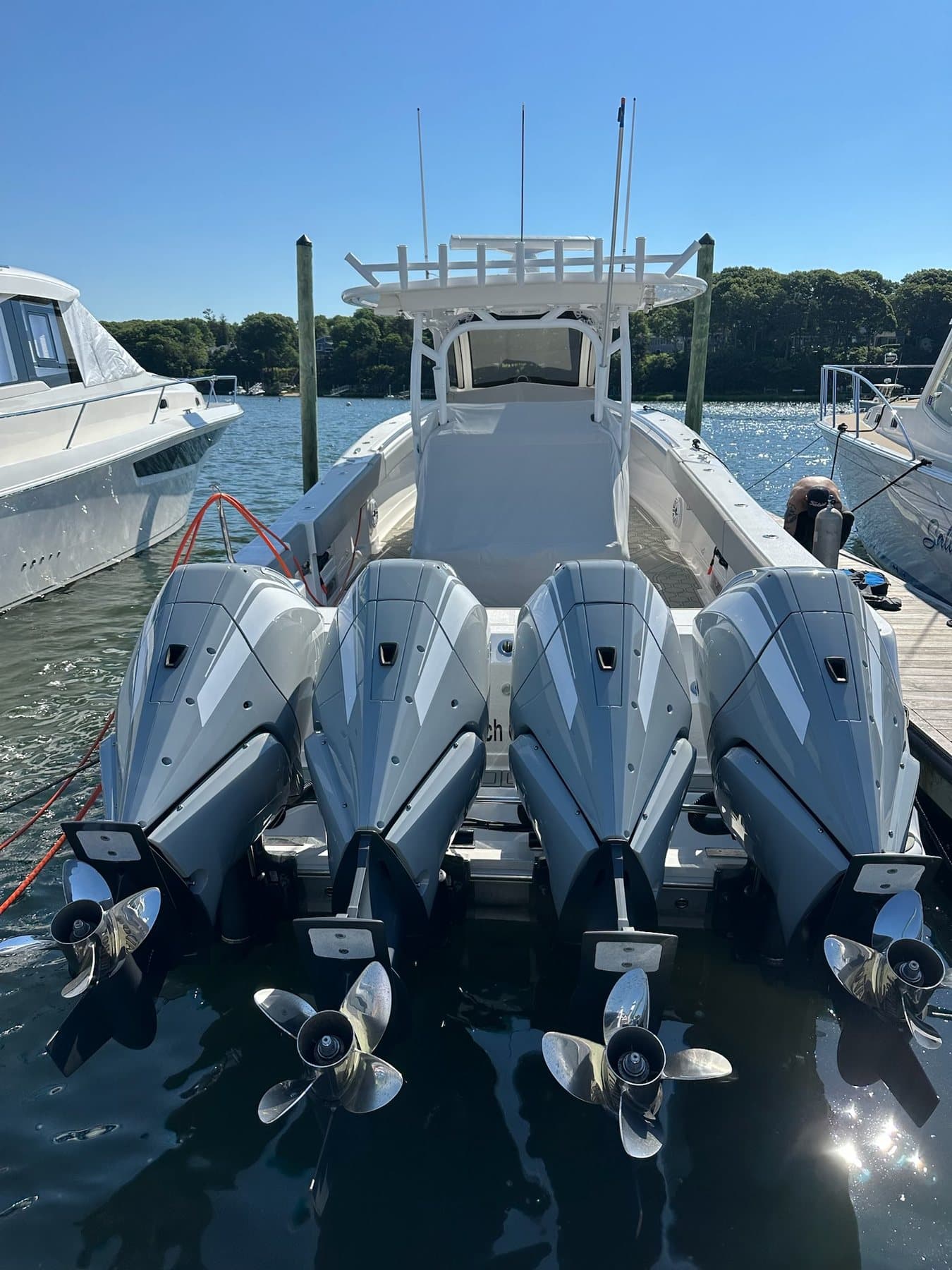 Triple outboard transom at marina dock