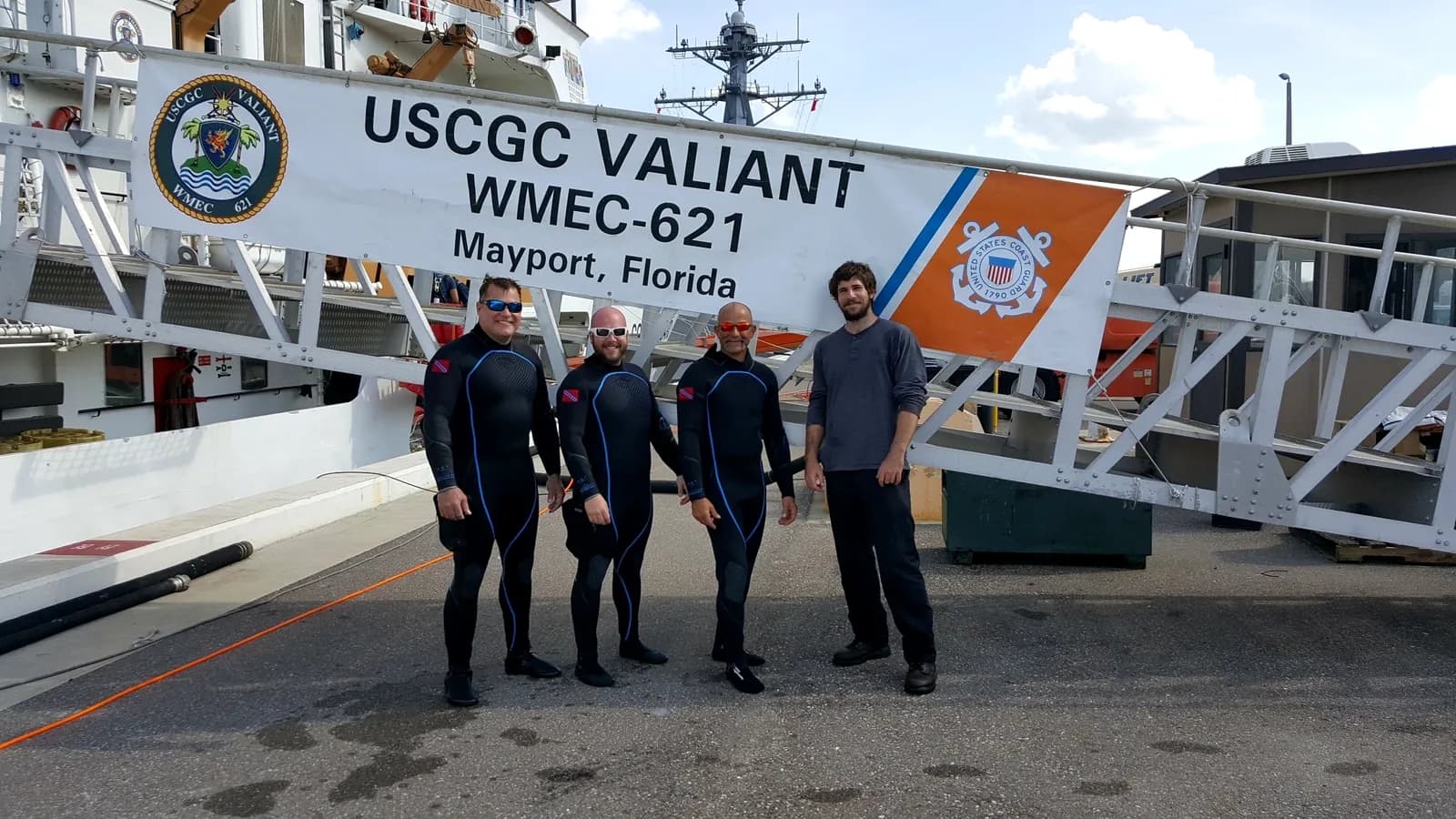 Diving team near a commercial vessel